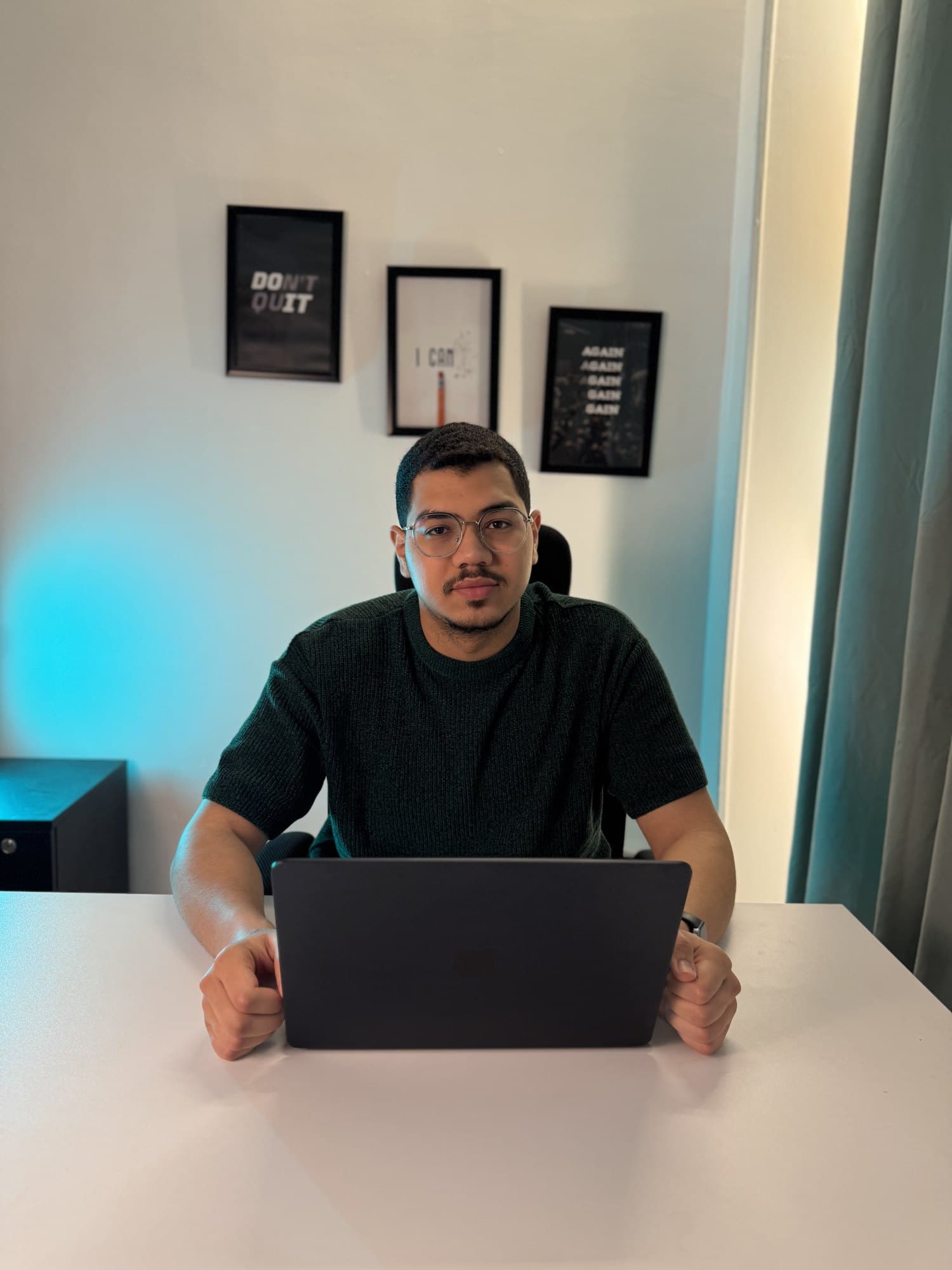 Seif Gomaa, performance media buyer, at his desk in Cairo